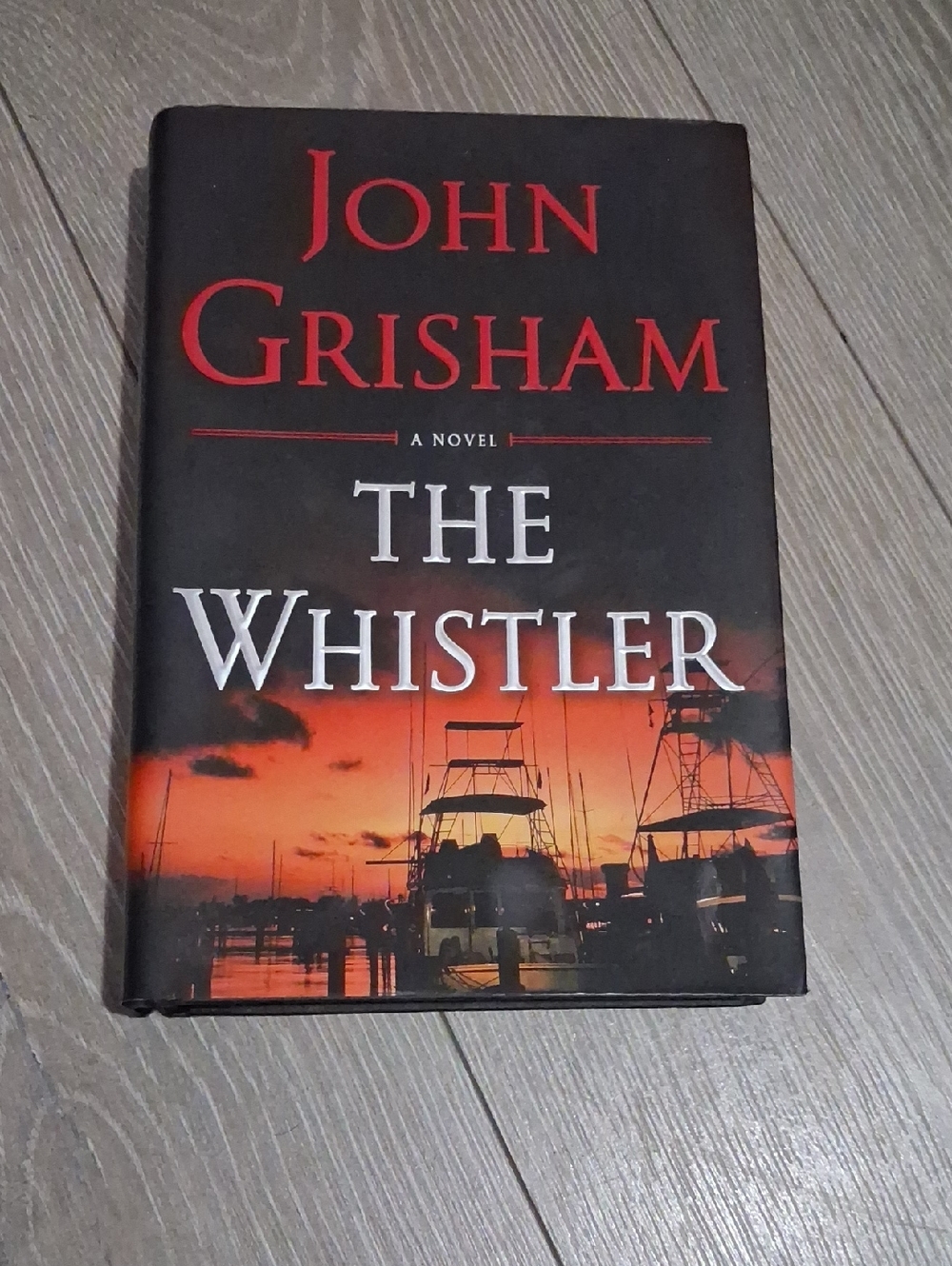 John Grisham "The Whistler" Hardcover - Black & Orange Cover